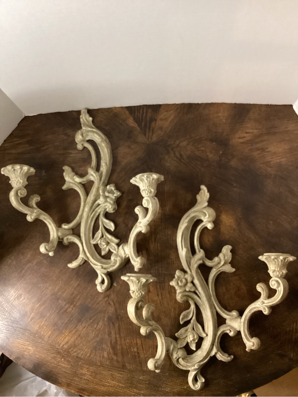 Ornate Pair of Wall Sconces in Antique Cream